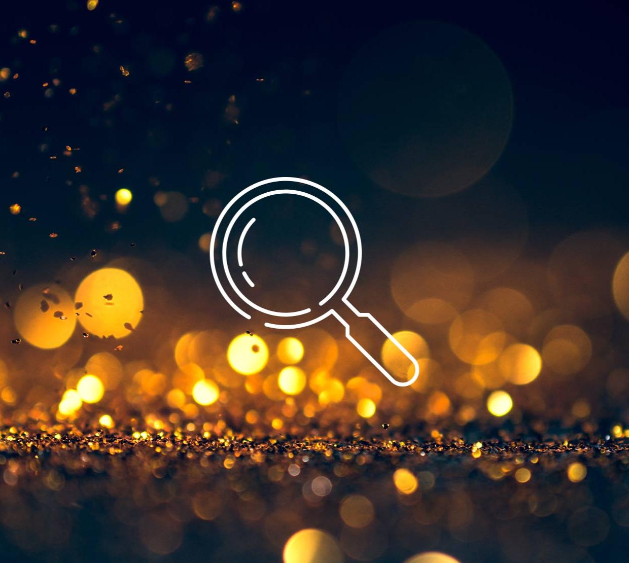 magnifying glass icon above light texture