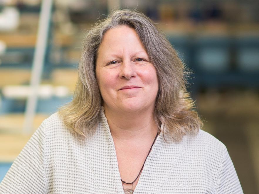 Jerri Bartholomew in the Aquatic Health lab