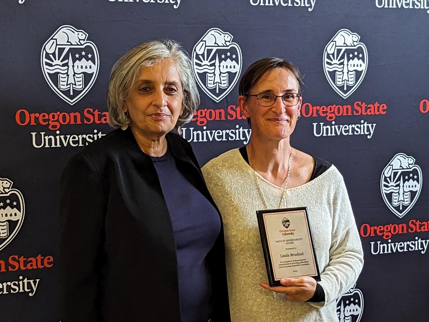 Jayathi Murthy standing with Linda Bruslind who is holding the OSU Faculty Affordability Award