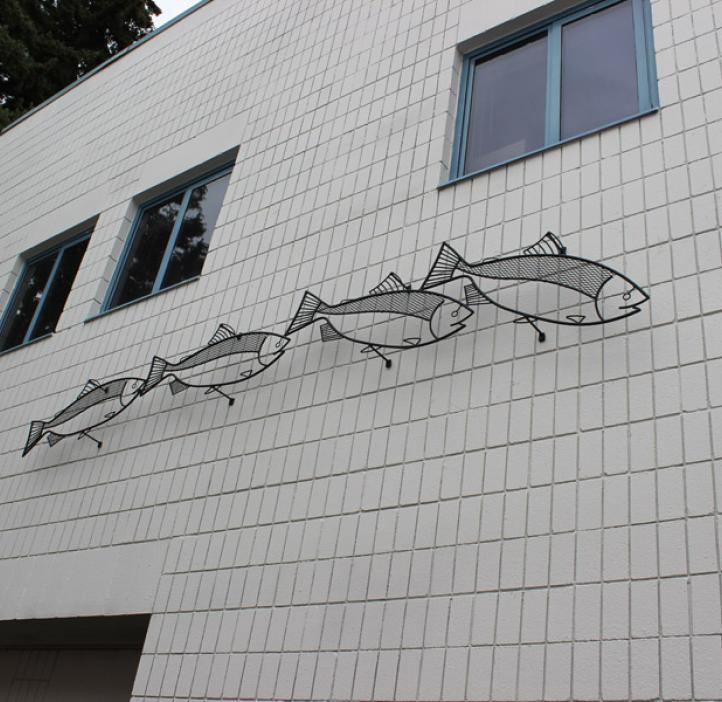 fish decoration along side of building